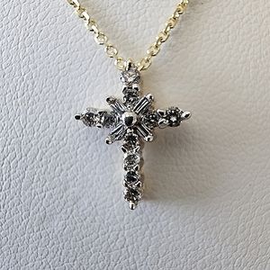 14 kt yellow gold baby size Diamond Cross Necklace W/ Tag. Firm W/ price